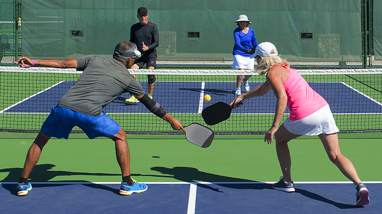 People playing Pickleball